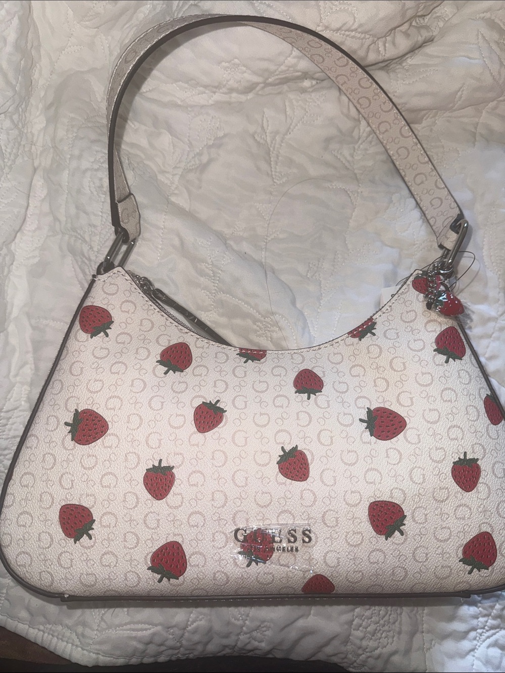Viral Guess White Shoulder Bag with Red Strawberry Print and strawberry charm